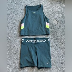 Teal Nike pro spandex and cropped tank top